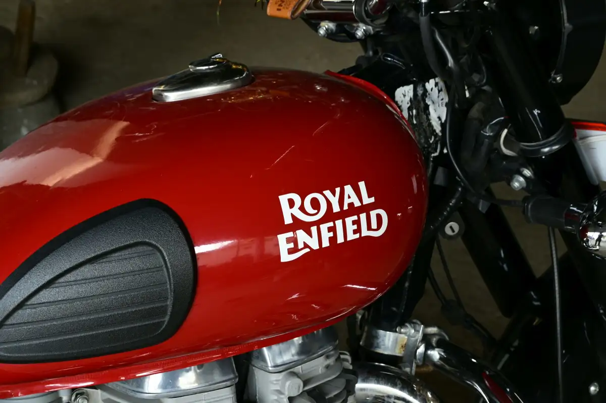 red and black motorcycle with black and gray motorcycle